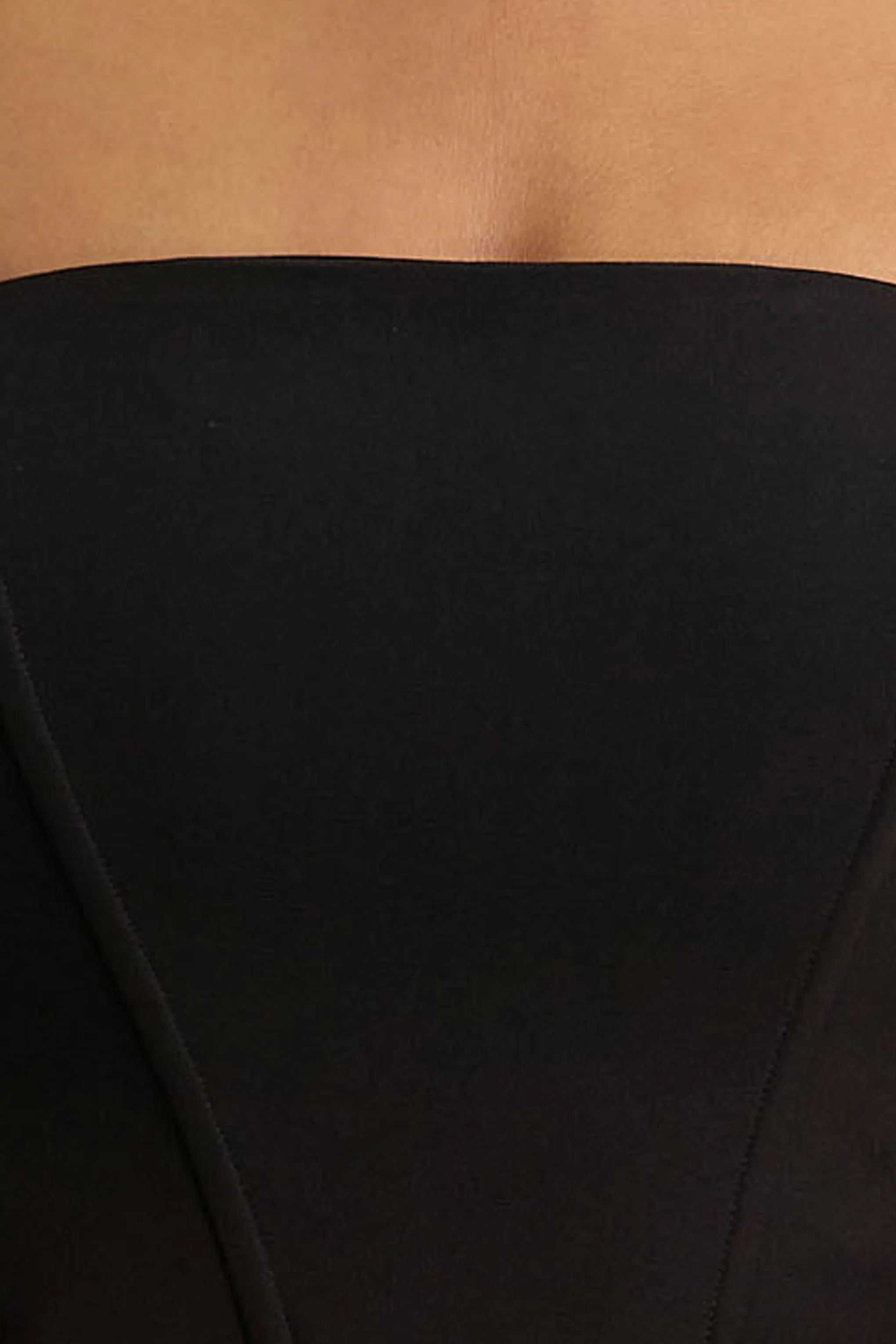 Panama | Schwarzer Bardot Jumpsuit mit cremefarbenen Puffärmeln - Image 6
